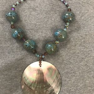 Beaded necklace with shell